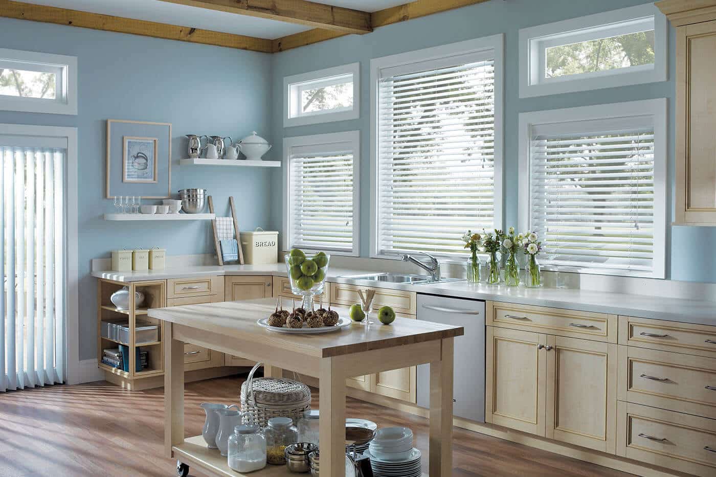 Custom made Timber Venetian Blinds in country woody kitchen. Available in Basswood, Pheonixwood and Western Red Cedar. Made In Australia. Available at Complete Blinds Brisbane.