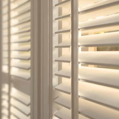 White plantation shutters in Brisbane suburb home with adjustable louvres for light and privacy