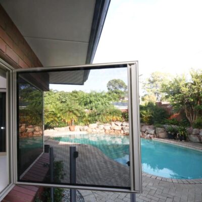 Crimsafe security window screens installed on the exterior of a Brisbane home showing mesh and frame detail